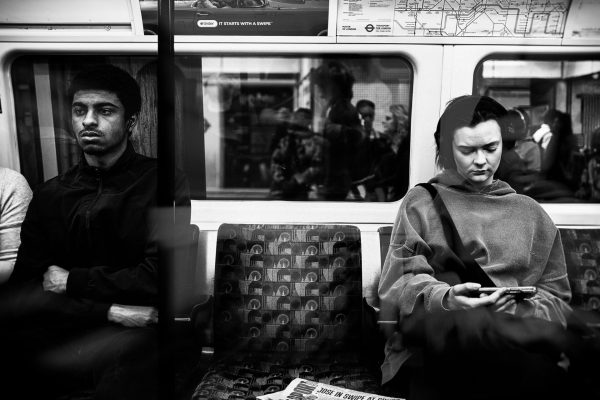 I was sick that morning, too much cider, and heading from Leicester square to Waterloo. There was a couple opposite me, after a while they got into an argument, I don't know what about, the tube line was old and loud. They carried on, same destination, but at least the girl got off.