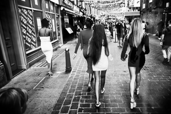Friday night, Chinatown full of smells and steam and these few women. Sipping vodka, laughing and heading out for the Friday night fever.